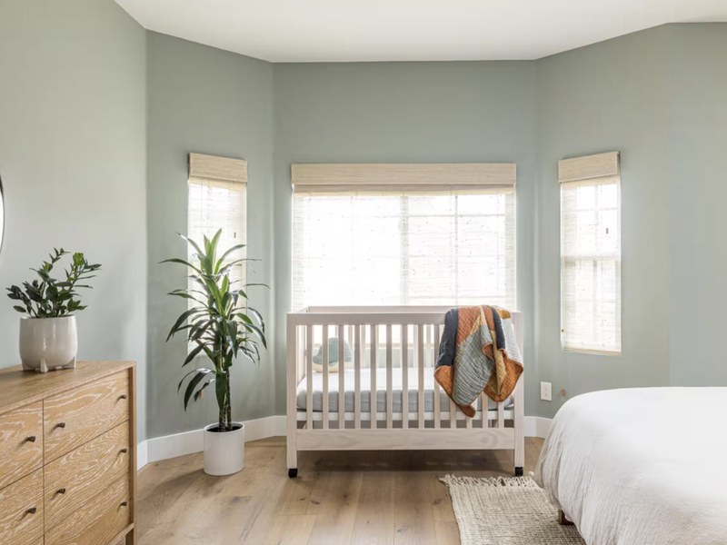 The crib set up in the bedroom